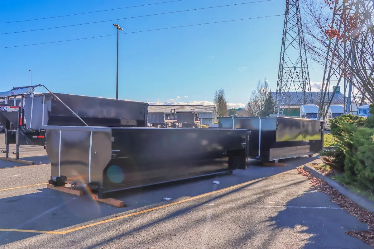 Roll-off dumpster ready for waste disposal at job site for Construction Dumpster Rental in Forks